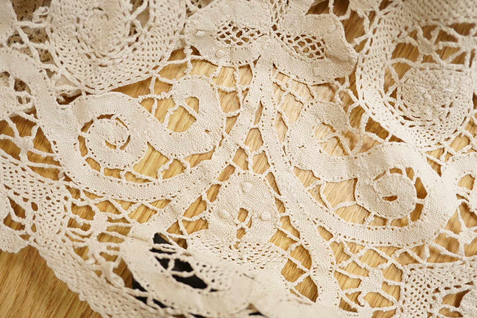 Two ornately designed tape lace bed covers, white cover 152cm x 236cm, beige cover 176cm x 364cm